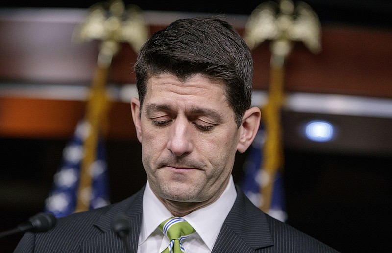 
              House Speaker Paul Ryan, R-Wis., pauses as he announces that he is pulling the troubled Republican health care overhaul bill off the House floor, short of votes and eager to avoid a humiliating defeat for President Donald Trump and GOP leaders, at the Capitol in Washington, Friday, March 24, 2017. (AP Photo/J. Scott Applewhite)
            