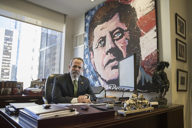 
              In this Friday, Feb. 17, 2017, photo, Trump Hotels CEO Eric Danziger poses for a portrait in his office at Trump Tower in New York. The Trumps are launching a new hotel chain in a bold expansion of a company that critics say is already too big and opaque for an owner who sits in the Oval Office. Called Scion, the aim is to open dozens in the next three years. (AP Photo/Mary Altaffer)
            