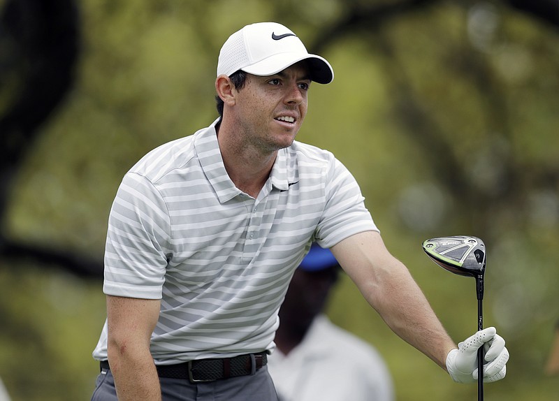 
              Rory McIlroy, of Northern Ireland, watches his drive on the first hole during round-robin play against Soren Kjeldsen of Denmark at the Dell Technologies Match Play golf tournament at Austin County Club, Wednesday, March 22, 2017, in Austin, Texas. (AP Photo/Eric Gay)
            