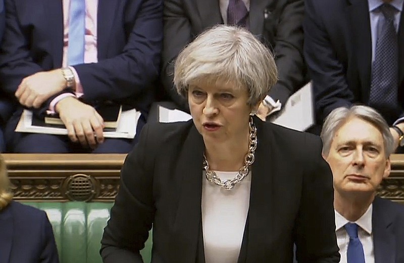 
              Britain's Prime Minister Theresa May speaks in the Houses of Parliament, Thursday March 23, 2017, following the attack in London Wednesday.  On Wednesday a man went on a deadly rampage, first drove a car into pedestrians then stabbed a police officer to death before being fatally shot by police within Parliament's grounds in London. (PA via AP)
            