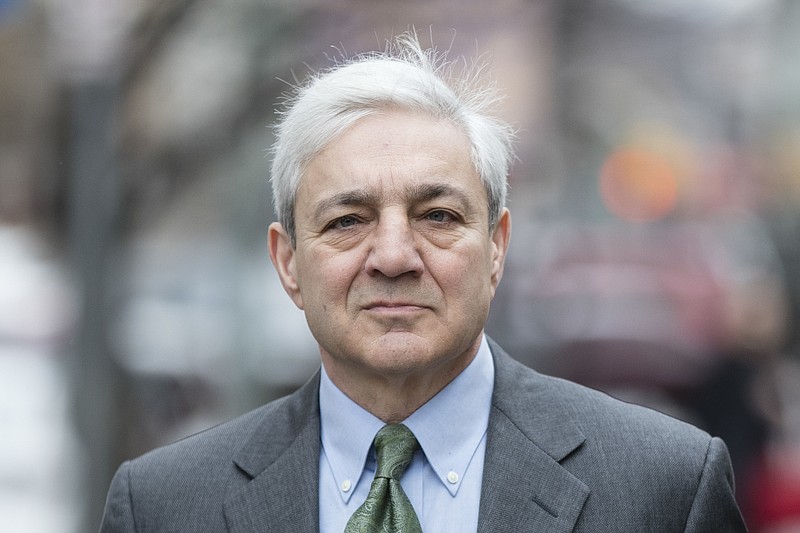 
              Former Penn State president Graham Spanier walks to the Dauphin County Courthouse in Harrisburg, Pa., Friday, March 24, 2017. Spanier faces charges that he failed to report suspected child sex abuse in the last remaining criminal case in the Jerry Sandusky child molestation scandal. (AP Photo/Matt Rourke)
            