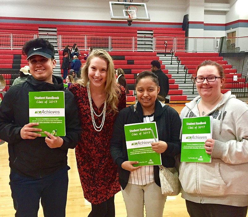 Hamilton County High School seniors Danny Villanueva, left, and Ali Cope and Maria Lopez, from right, appear with Chamber staffer Amanda Ellis to celebrate tnAchieves mentorship program.