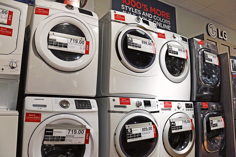 
              In this Wednesday, Feb. 8, 2017, photo, washers and dryers appear on display for sale at a J.C. Penney store in Pittsburgh. On Friday, March 24, 2017, the Commerce Department releases its February report on durable goods. (AP Photo/Gene J. Puskar)
            