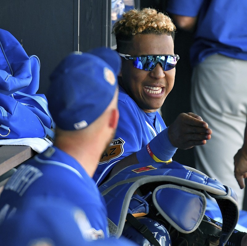 
              Kansas City Royals catcher Salvador Perez and pitcher Danny Duffy discuss pitches in the dugout during a spring training baseball game against the Seattle Mariners on Friday, March 24, 2017, in Peoria, Ariz. (John Sleezer/The Kansas City Star via AP)
            