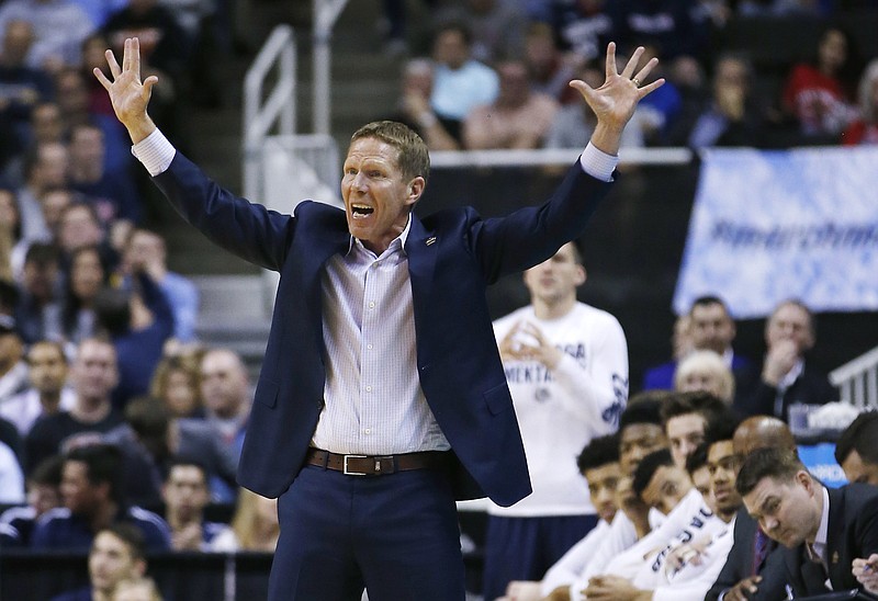 
              Gonzaga head coach Mark Few gestures from the bench as his team play West Virginia during the second half of an NCAA Tournament college basketball regional semifinal game Thursday, March 23, 2017, in San Jose, Calif. (AP Photo/Tony Avelar)
            