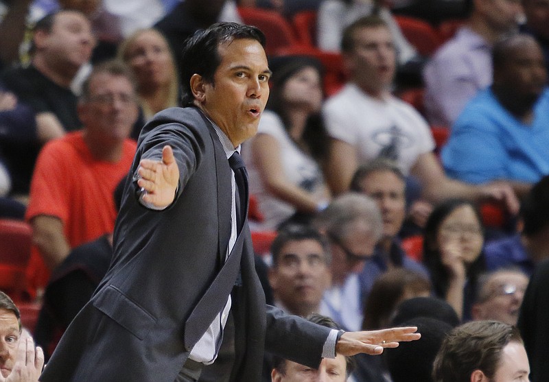 
              Miami Heat head coach Erik Spoelstra directs his team's play against the Toronto Raptors in the second quarter of an NBA basketball game, Thursday, March 23, 2017, in Miami. (AP Photo/Joe Skipper)
            
