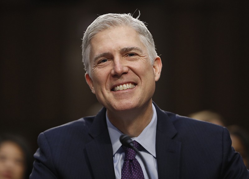 
              In this March 21, 2017 photo, Supreme Court Justice nominee Neil Gorsuch smiles on Capitol Hill in Washington, during his confirmation hearing before the Senate Judiciary Committee. (AP Photo/Pablo Martinez Monsivais)
            