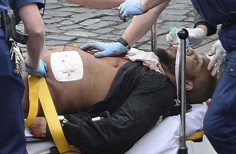 
              FILE- In this March 22, 2017 file photo, the attacker Khalid Masood is treated by emergency services outside the Houses of Parliament London. British Police named on Thursday March 23, 2017,  Khalid Masood as The Houses of Parliament attacker. (Stefan Rousseau/PA via AP, File).
            