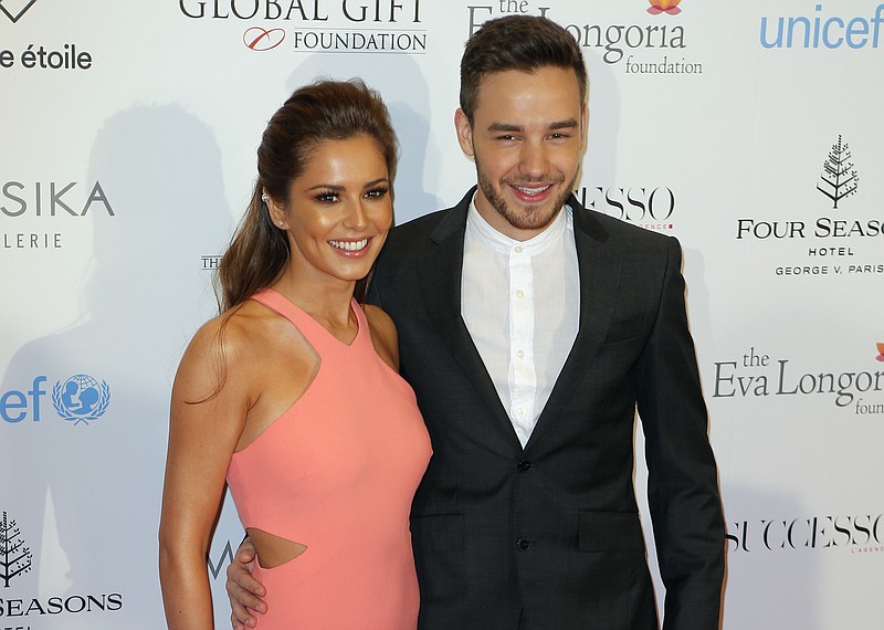 
              FILE - In this Monday, May 9, 2016 file photo, Cheryl Cole and Liam Payne pose during a photo call for the Global Gift Gala at Four Seasons Hotel George V in Paris. Former Girls Aloud star Cheryl and partner Liam Payne of One Direction fame announced on Saturday March 25, 2017, the birth of their first child. (AP Photo/Francois Mori, File)
            