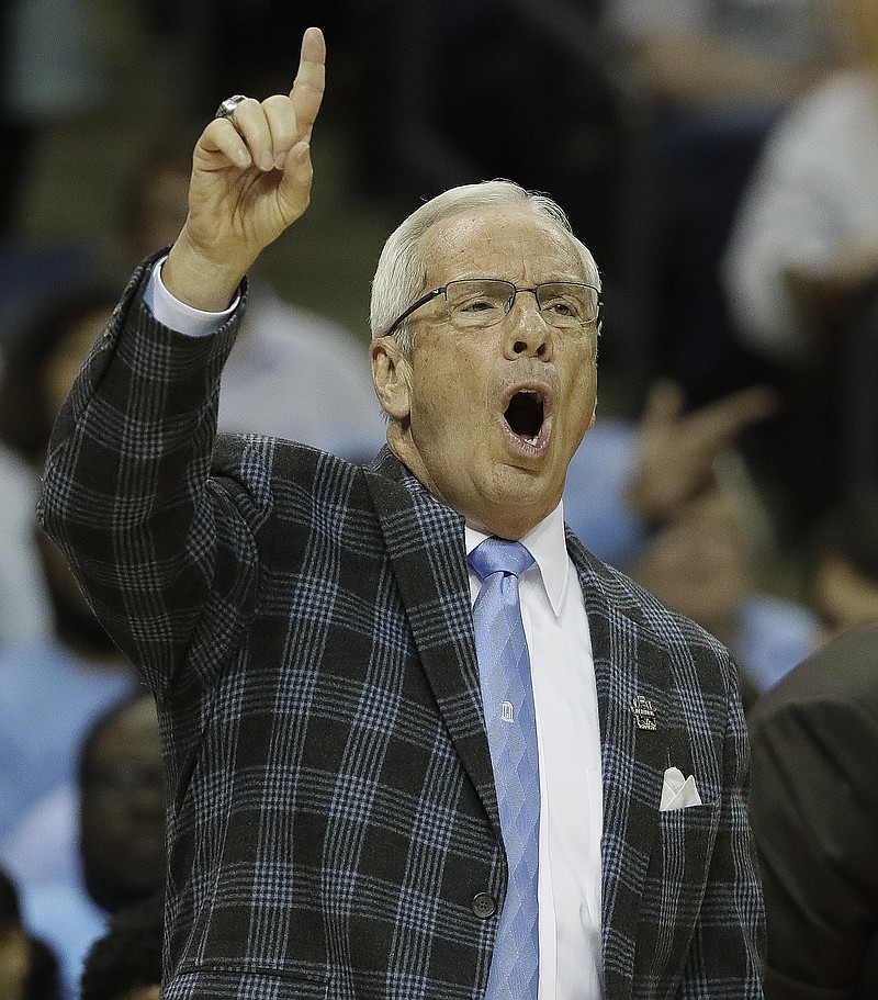 North Carolina head coach Roy Williams speaks to players against Kentucky in the first half of the South Regional final game in the NCAA college basketball tournament Sunday, March 26, 2017, in Memphis, Tenn. (AP Photo/Mark Humphrey)

