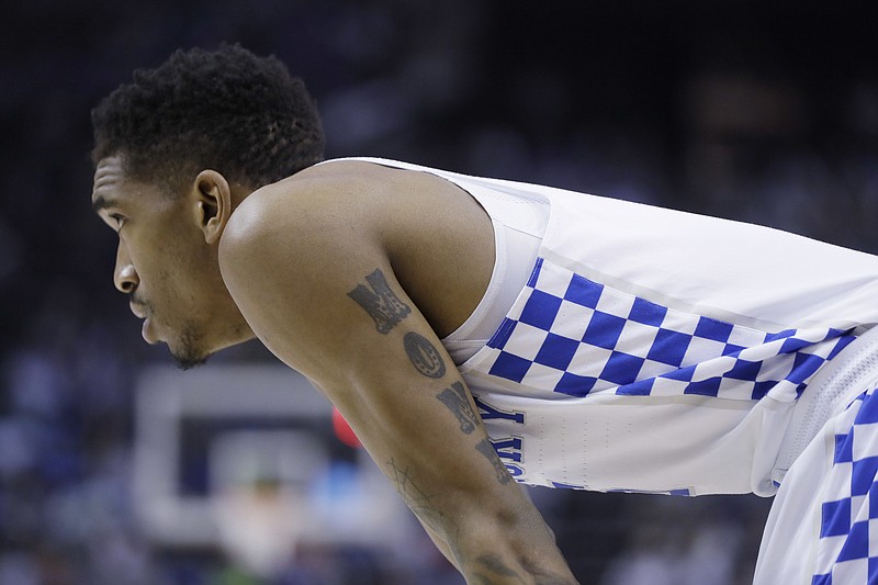 
              Kentucky guard Malik Monk watches play against UCLA in the first half of an NCAA college basketball tournament South Regional semifinal game Friday, March 24, 2017, in Memphis, Tenn. (AP Photo/Mark Humphrey)
            