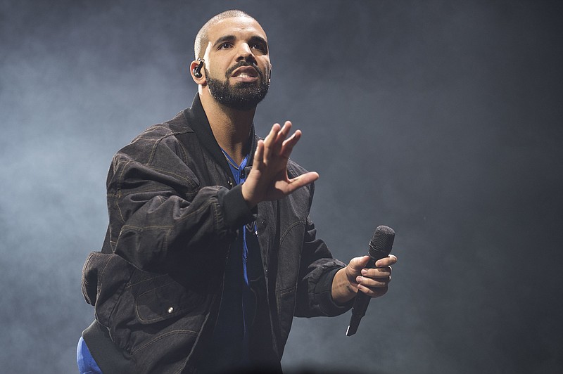 
              FILE - In this Oct. 8, 2016 file photo, Drake performs onstage in Toronto. Drake's new album “More Life” has broken the U.S. record for the number of streams from a single album in one week. The rapper’s 22-track album recorded 385 million streams across all platforms. (Photo by Arthur Mola/Invision/AP, File)
            