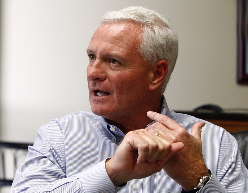 FILE - This April 19, 2013, file photo shows Jimmy Haslam, CEO of Pilot Flying J, speaking during a press conference at the company headquarters in Knoxville, Tenn. Tennessee Gov. Bill Haslam has struggled almost from the start of his administration to fulfill a campaign pledge to avoid handling matters relating to Pilot Flying J, the truck stop chain his family owns. Now, an FBI investigation of alleged fraud by the sales staff at the nation's largest diesel retailer has brought increased scrutiny and raised more questions about links between the governor and Pilot.  (AP Photo/Wade Payne, File)