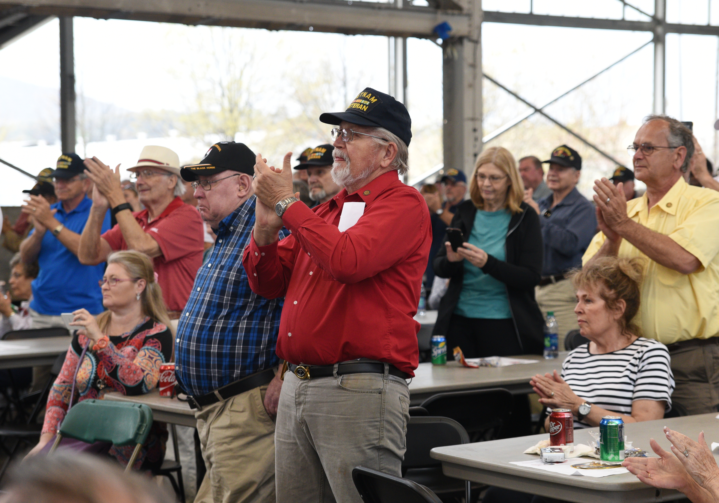 The audience applauds Monday, March 27, 2017 during a Welcome Home celebration for Vietnam veterans at the First Tennessee Pavilion.