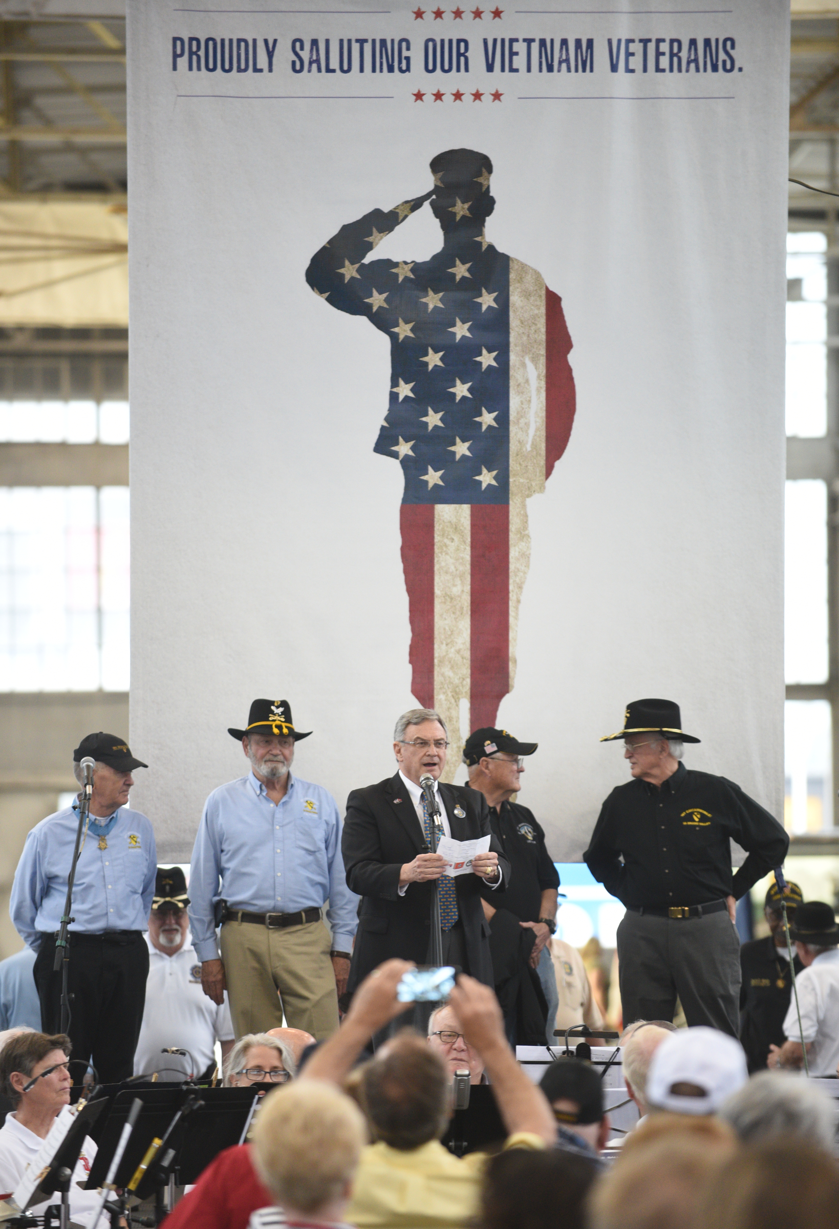 Army Maj. Gen. Bill Raines, center, speaks Monday, March 27, 2017 during a Welcome Home celebration for Vietnam veterans at the First Tennessee Pavilion.