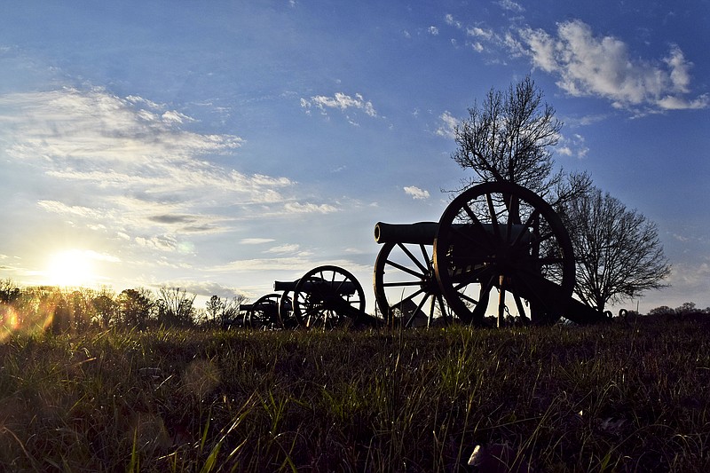 The sun sets beyond cannons that mark the position of Slocomb's Confederate Battery during the 1863 battle of Chickamauga.  President Donald Trump's budget could have a impact on the management of the Chattanooga area's Federal Lands such as Chickamauga and Chattanooga National Military Park.  
