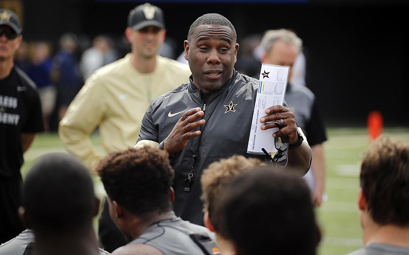 Vanderbilt fourth-year football coach Derek Mason talks to his players during this past Saturday's "Spring Showcase" in Nashville.