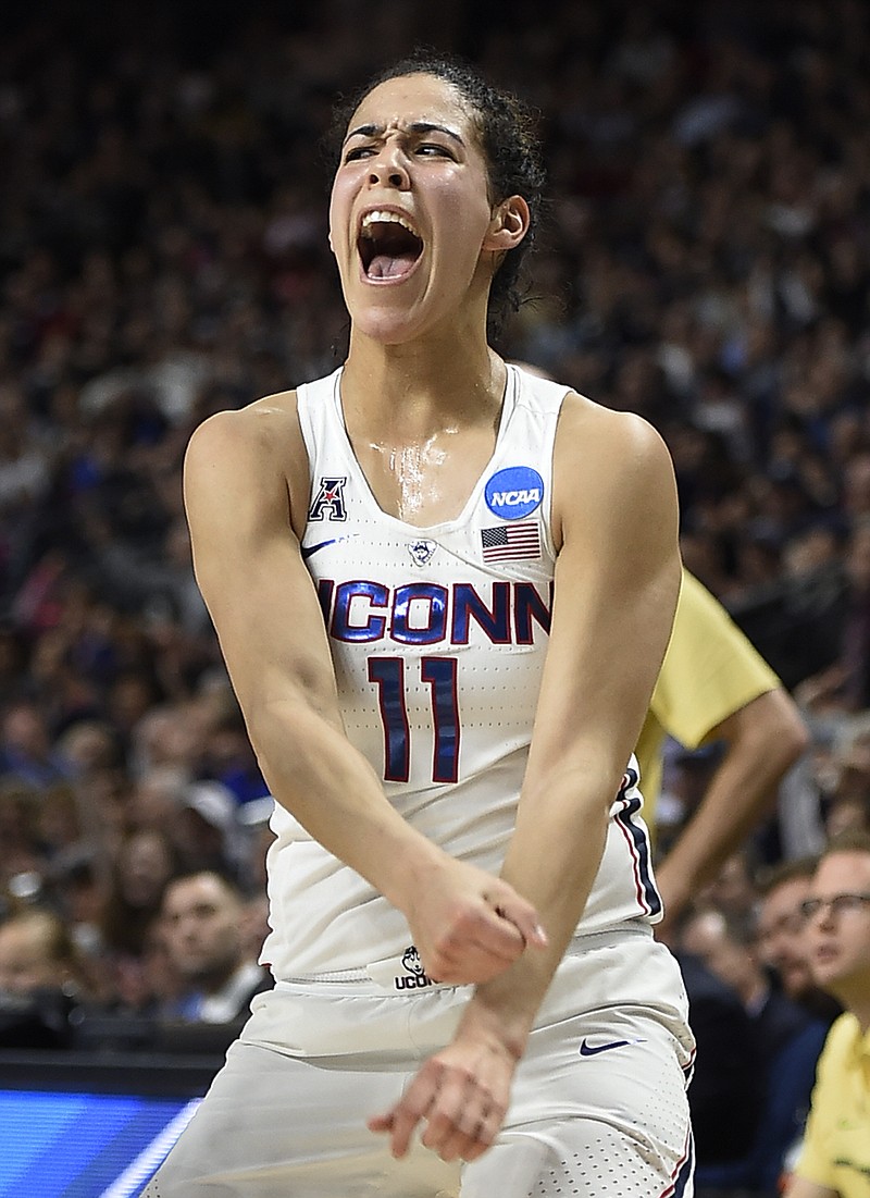 
              Connecticut's Kia Nurse reacts after hitting a 3-point basket during the first half of a regional final game against Oregon in the NCAA women's college basketball tournament, Monday, March 27, 2017, in Bridgeport, Conn. (AP Photo/Jessica Hill)
            