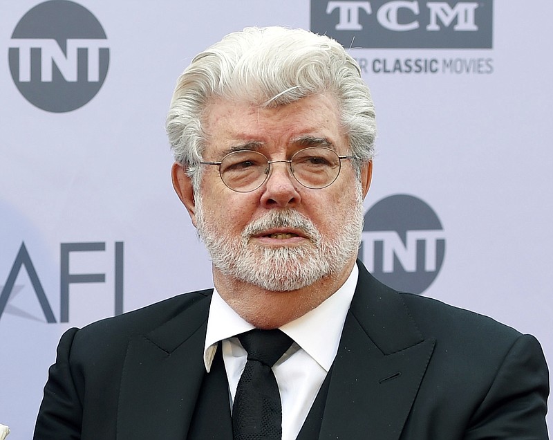 
              FILe - In this June 9, 2016 file photo, filmmaker George Lucas appears at the 2016 AFI Life Achievement Award Gala Tribute to John Williams in Los Angeles.Lucas has given another $10 million to the University of Southern California’s School of Cinematic Arts to fund the student diversity program he helped establish. The donation was announced Monday by USC, Lucas’ alma mater. Last fall, USC established a foundation in Lucas’ name to support students from underrepresented communities who qualify for financial support. (Photo by Chris Pizzello/Invision/AP, File)
            