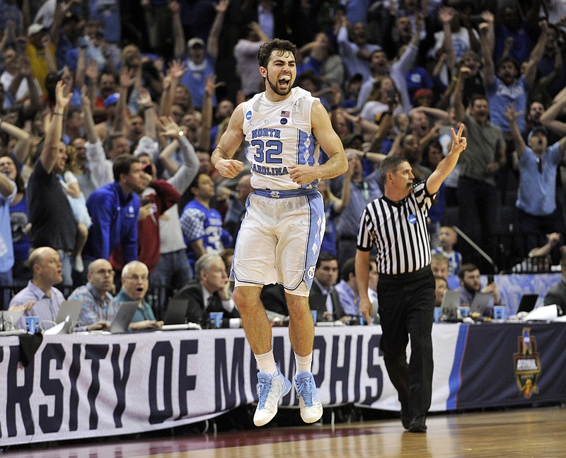 
              North Carolina forward Luke Maye celebrates after shooting the winning basket in the second half of the South Regional final game against Kentucky in the NCAA college basketball tournament Sunday, March 26, 2017, in Memphis, Tenn. The basket gave North Carolina a 75-73 win. (AP Photo/Brandon Dill)
            