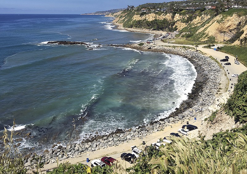 
              In this Sunday, March 26, 2017, photo, Royal Palms Beach in the San Pedro area of Los Angeles is protected by boulders placed there to forestall erosion. A new study predicts that with limited human intervention, 31 percent to 67 percent of Southern California beaches could completely erode back to coastal infrastructure or sea cliffs by the year 2100, with sea-level rises of 3.3 feet (1 meter) to 6.5 feet (2 meters). The study released Monday, March 27, 2017, used a new computer model to predict shoreline effects caused by sea level rise and changes in storm patterns due to climate change. (AP Photo/John Antczak)
            