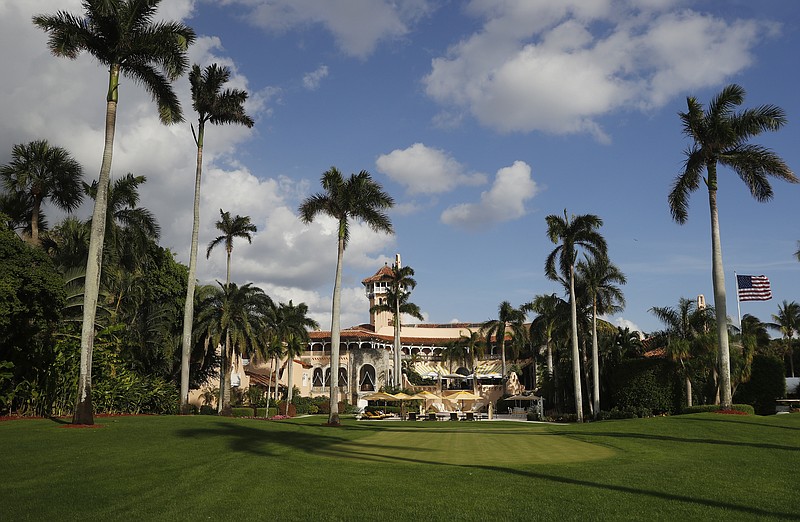 
              In this photo taken Nov. 27, 2016, Mar-A Lago is seen from the media van window, in Palm Beach, Fla. A government watchdog will examine the taxpayer-funded travel costs when President Donald Trump travels to the Mar-a-Lago resort in Florida and the security procedures surrounding those trips, several congressional Democrats announced Tuesday, March 28, 2017.  (AP Photo/Carolyn Kaster)
            