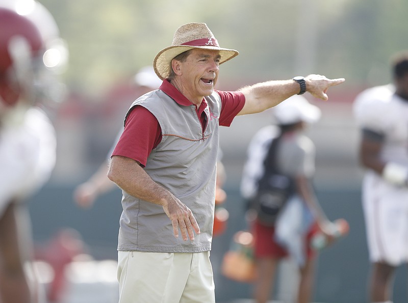 Alabama football coach Nick Saban, shown here during Tuesday's two-hour practice in full pads, will have Chris Weinke and Dan Werner as offensive analysts this season.