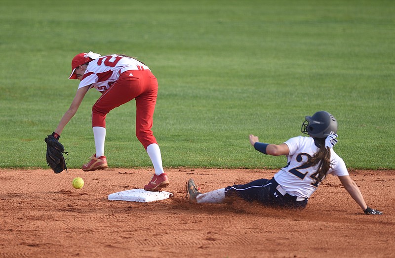 Walker Valley's Sydney Ventura slides safely to second as  Ooltewah second baseman Shelby Sutton drops the ball Tuesday, March 28, 2017, at Walker Valley High School.