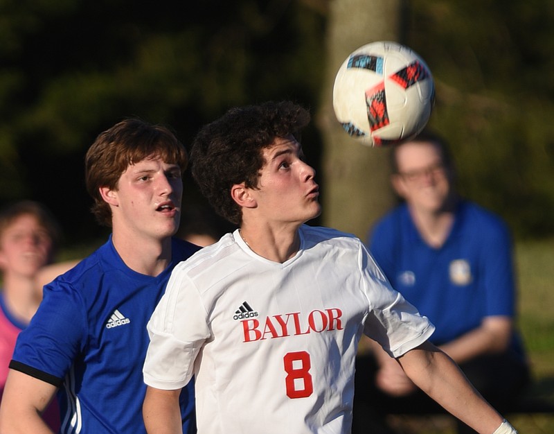 Baylor's John Musick and McCallie's Ross Wortman pursue the ball Tuesday, March 28, 2017, at Baylor.