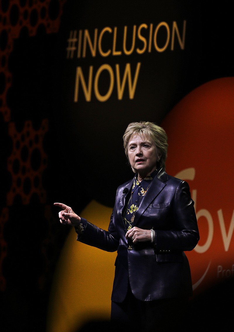 
              Former Secretary of State Hillary Clinton gestures while speaking before the Professional Businesswomen of California Tuesday, March 28, 2017, in San Francisco. Clinton is in San Francisco for one of her first public speeches since losing the 2016 presidential race. (AP Photo/Ben Margot)
            