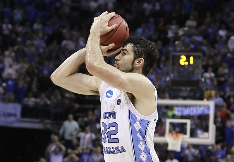 
              North Carolina forward Luke Maye (32) shoots the winning basket in the second half of the South Regional final game in the NCAA college basketball tournament Sunday, March 26, 2017, in Memphis, Tenn. The basket gave North Carolina a 75-73 win. (AP Photo/Mark Humphrey)
            