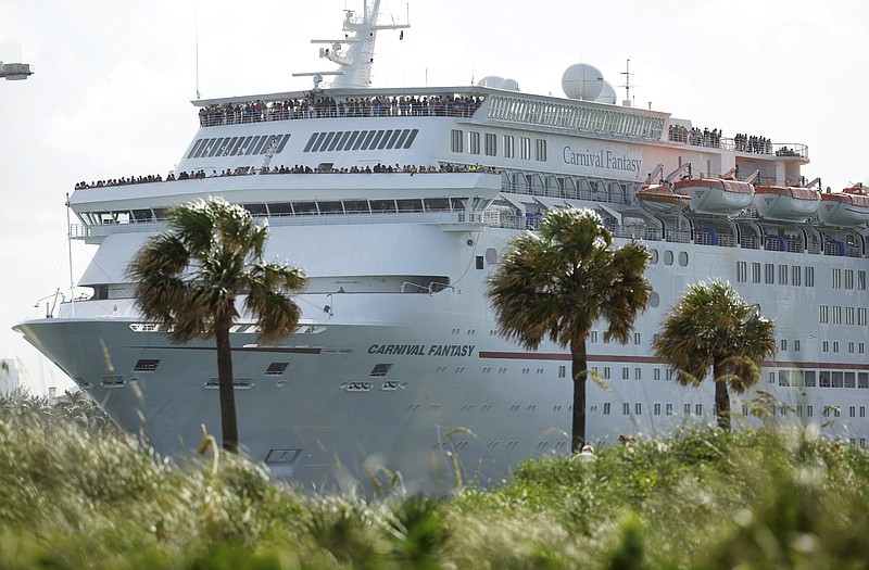 
              FILE - In this Monday, June 20, 2016, file photo, the Carnival Fantasy cruise ship leaves PortMiami, in Miami Beach, Fla. Carnival Corporation reports earnings Tuesday, March 28, 2017. (AP Photo/Lynne Sladky, File)
            