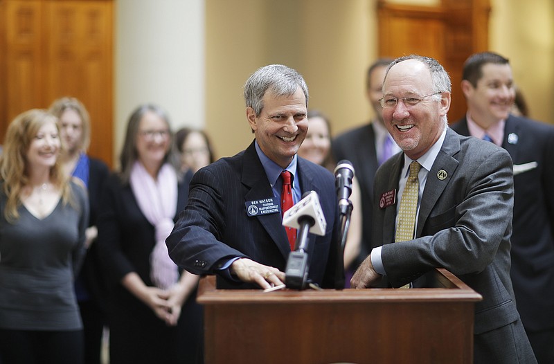 
              Georgia Sen. Ben Watson, R - Savannah, left and Rep. Allen Peake, R - Macon, speak during a press conference on a bill opening a popular medical marijuana program to more patients at the Capitol in Atlanta, Tuesday, March 28, 2017. The House approved a bill Tuesday that would add six new diagnoses to the list of qualifying conditions for medical cannabis oil, including autism, AIDS, Tourette's syndrome, and Alzheimer's disease. The bill will have to pass the Senate before moving to the governor who has signaled his approval of the limited program expansion. (AP Photo/David Goldman)
            