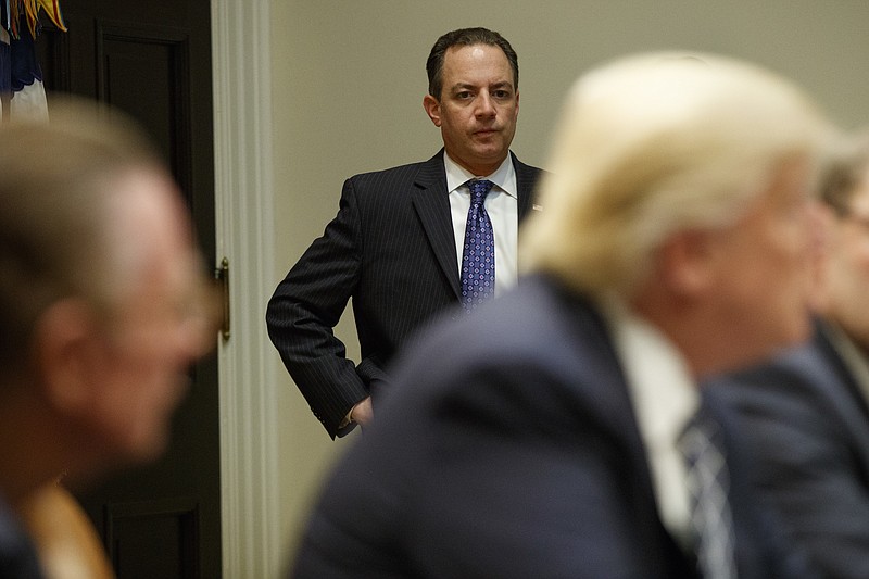 
              White House Chief of Staff Reince Priebus watches a meeting between President Donald Trump and the Fraternal Order of Police, Tuesday, March 28, 2017, in the Roosevelt Room of the White House in Washington. (AP Photo/Evan Vucci)
            