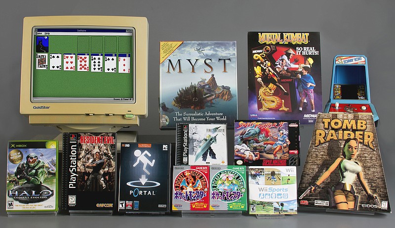 
              In this March 16, 2017 photo provided by The Strong museum, the 12 finalists for induction this year into The Strong museum's World Video Game Hall of Fame are pictured at the museum in Rochester, New York. The finalists, from left, are: top row, "Microsoft Windows Solitaire," "Myst," "Mortal Kombat," "Donkey Kong,'' center, "Final Fantasy VII,'' "Street Fighter II," bottom row, ''Halo: Combat Evolved,'' "Resident Evil," "Portal," "Pokemon Red and Green," "Wii Sports" and "Tomb Raider." The 2017 class will be announced May 4. (Bethany Mosher/The Strong via AP
            