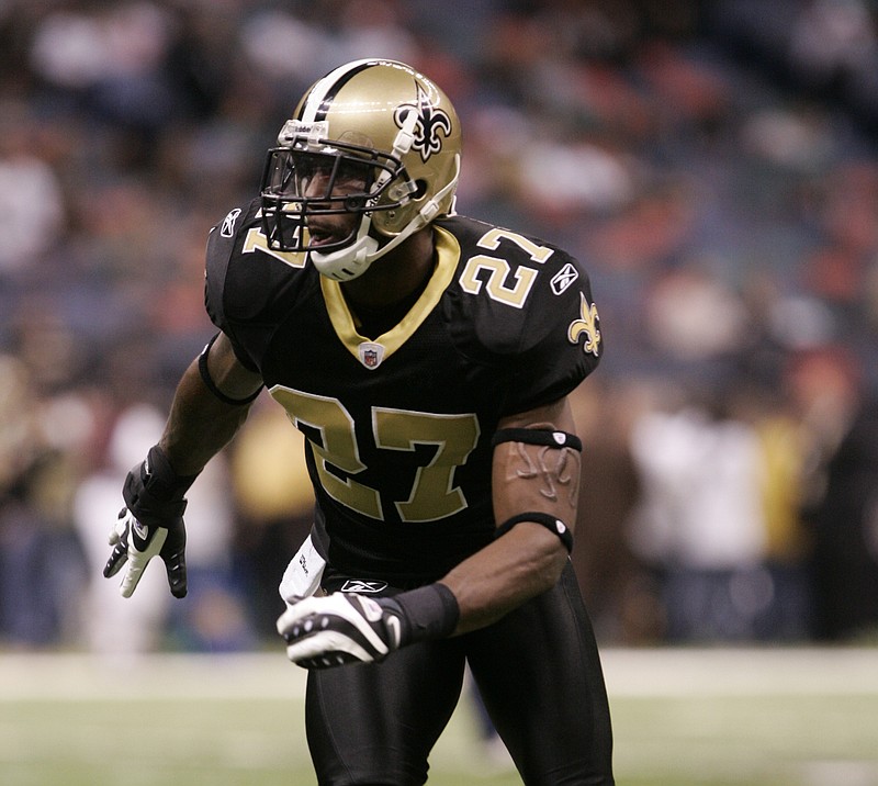 
              In this photo taken Nov. 8, 2009, then-New Orleans Saints corner back Malcom Jenkins warms up before an NFL football game against the Carolina Panthers in New Orleans. Jenkins, free-agent wide receiver Anquan Boldin and other players were meeting with members of Congress this week to push for legislation that leads to improved relationships between minority communities and local police. (AP Photo/Patrick Semansky)
            