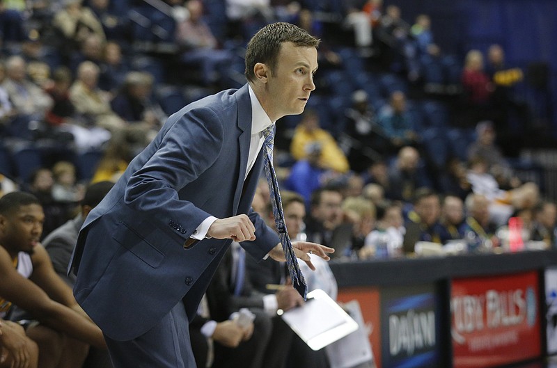 Matt McCall instructs UTC men's basketball players during a home game against Louisiana-Monroe in December. After two seasons leading the Mocs, McCall took the job as head coach at UMass on Wednesday.