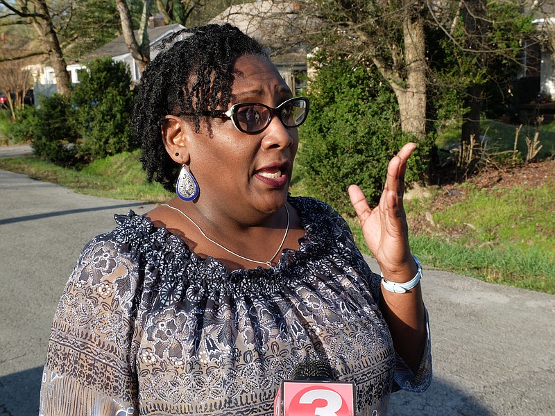 Shawnee Trail resident Anita Franklin tells what she heard in the middle of the night as Chattanooga police work the scene a block away at an overnight shooting in the 300 block of Shawnee Trail in Brainerd.