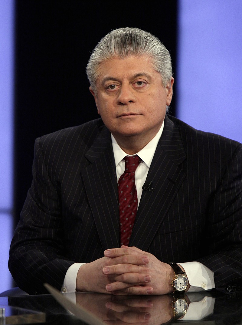 
              FILE- In this April 11, 2011, file photo, Andrew Napolitano appears on the "Varney & Co." program on the Fox Business Network, in New York. Fox News Channel legal analyst Napolitano returned to the air on Wednesday, March 29, 2017, saying he stood by his claim about spying on President Donald Trump that got him benched by the network for more than a week. Napolitano had said on Fox that British intelligence officials had helped former President Barack Obama spy on Trump. (AP Photo/Richard Drew, File)
            