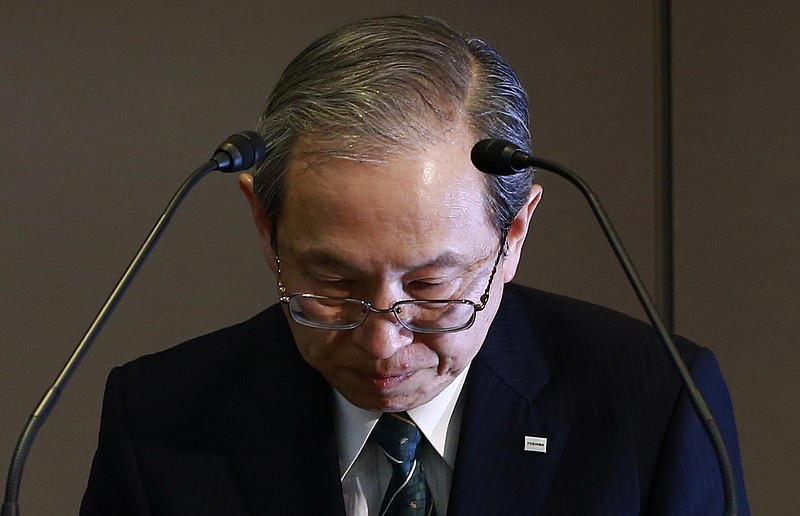 
              Toshiba Corp. President Satoshi Tsunakawa bows during a press conference at the company's headquarters in Tokyo, Wednesday, March 29, 2017. Japan's embattled Toshiba said Wednesday that its U.S. nuclear unit Westinghouse Electric Co. has filed for bankruptcy protection. Toshiba said in a statement that it filed the chapter 11 petition in the U.S. Bankruptcy Court of New York. (AP Photo/Shizuo Kambayashi)
            