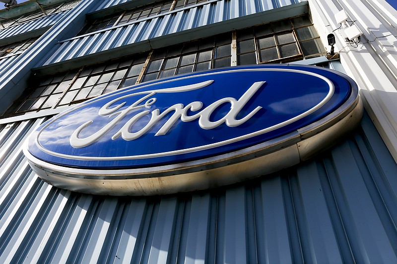 
              FILE - This Thursday, Nov. 19, 2015, file photo, shows a blue oval Ford sign above the entrance to Butler County Ford in Butler, Pa. Ford is recalling more than 440,000 vehicles in North America to fix problems that can cause engine fires and doors to open unexpectedly. The first recall covers about 230,000 Escape SUVs, Fiesta ST subcompacts, Fusion midsize cars and Transit Connect vans with 1.6-Liter turbocharged engines from 2013 through 2015. The company also is adding 211,000 vehicles to a previous recall to replace faulty door latches. That recall covers the 2014 Fiesta and the 2013 and 2014 Fusion and Lincoln MKZ. (AP Photo/Keith Srakocic, File)
            