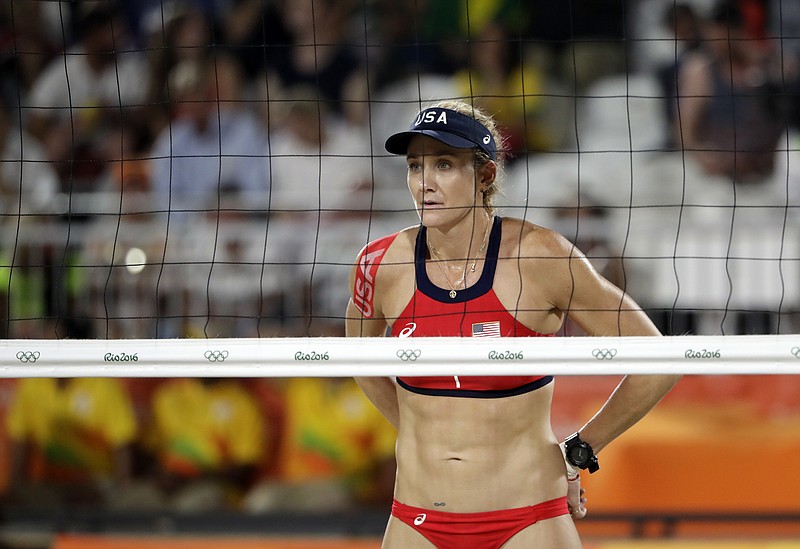 
              FILE - In this Aug. 15, 2016, file photo, United States' Kerri Walsh Jennings awaits a serve against Australia during a women's beach volleyball quarterfinal match at the 2016 Summer Olympics in Rio de Janeiro, Brazil.  The five-time Olympian Kerri has not yet committed to play in AVP events this summer, leading the domestic beach volleyball tour to announce its 2017 schedule without including the game’s top draw among  “the most respected names in the sport” who are expected to participate.  (AP Photo/Marcio Jose Sanchez, File)
            