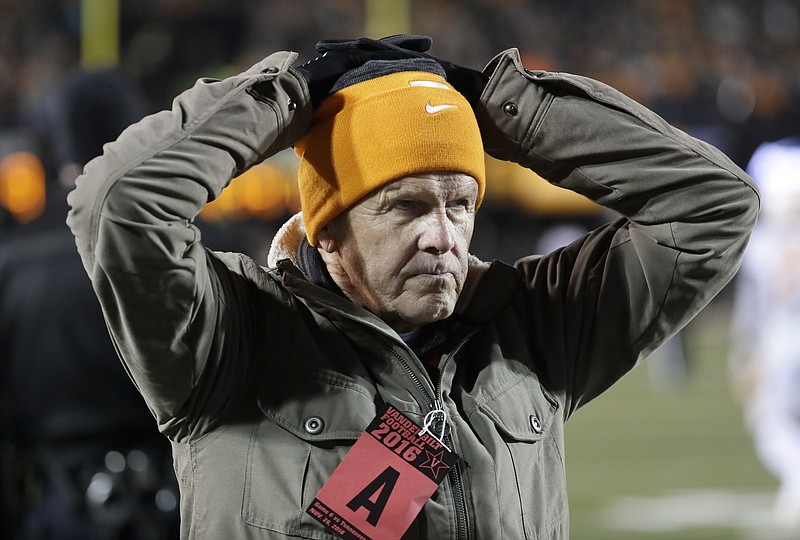 In this Nov. 26, 2016, file photo, Tennessee athletic director Dave Hart reacts to a play during Tennessee's 45-34 loss to Vanderbilt in an NCAA college football game in Nashville, Tenn. Hart heads into his final days as Tennessee's athletic director confident in his belief that he's leaving the program in better shape than when he arrived in 2011. Hart announced in August that he was stepping down, and his last official day on the job is Friday, March 31, 2017. He will be replaced by former Kansas State athletic director John Currie. (AP Photo/Mark Humphrey, File)