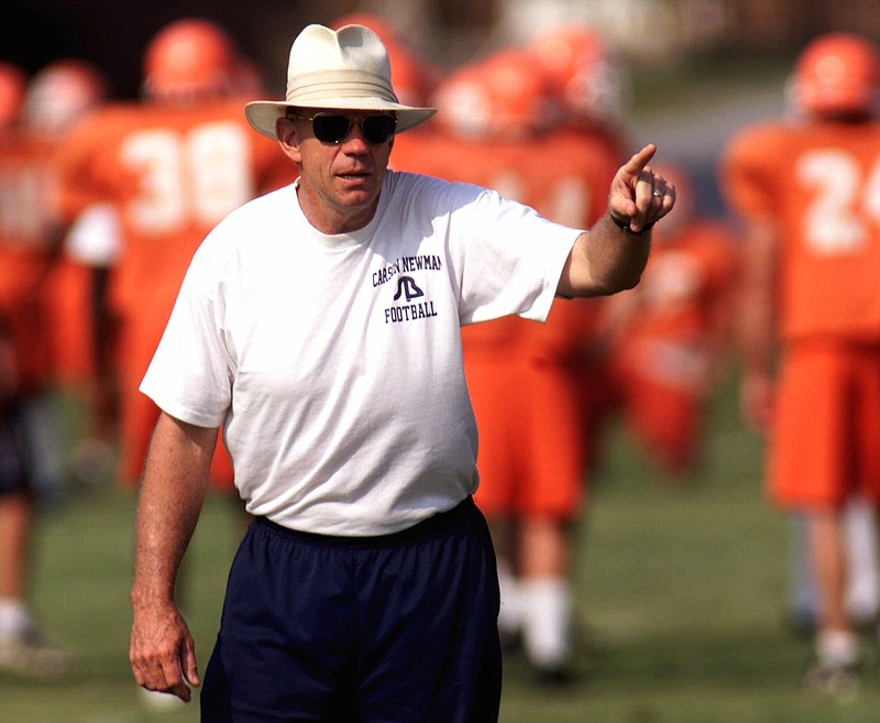 In this Aug. 9, 2000, file photo, Carson-Newman head coach Ken Sparks gives directions to his team during the football practice in Jefferson City, Tenn. Sparks, a football coach who won 338 games for Division II Carson-Newman to rank fifth on the NCAA's all-time list, died Wednesday, Mach 29, 2017, Carson-Newman athletic department spokesman Adam Cavalier said. He was 73. Sparks spent his entire 37-year head coaching career at Carson-Newman and went 338-99-2. (AP Photo/Wade Payne, File)
