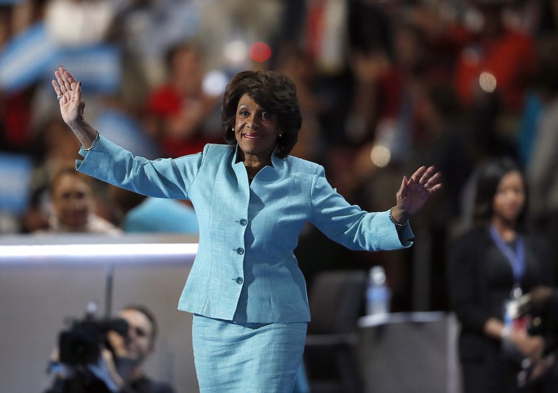 
              FILE - In this July 27, 2016, file photo, U.S. Rep. Maxine Waters, D-Calif., takes the stage to speak during the third day of the Democratic National Convention in Philadelphia. Activist Brittany Packnett encouraged people to tweet under #BlackWomenAtWork Tuesday, March 28, 2017. It’s a response to O’Reilly’s comment Tuesday that Democratic U.S. Rep. Maxine Waters’ hair was a "James Brown wig." He later apologized. (AP Photo/Paul Sancya, File)
            