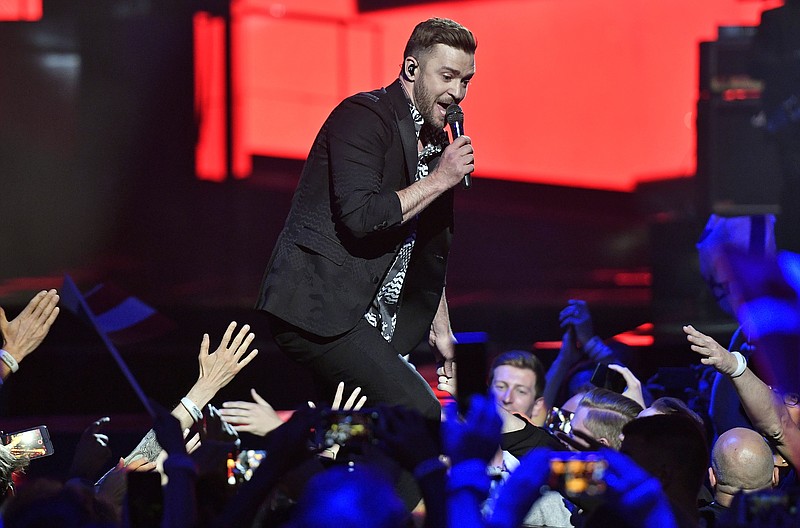 
              FILE - Int his May 14, 2016, file photo, singer Justin Timberlake performs during the Eurovision Song Contest final in Stockholm, Sweden. Timberlake is scheduled to perform on Oct. 21, 2017, at the Circuit of the Americas in Austin, Texas, during Formula One's only stop in the U.S., organizers of the U.S. Grand Prix announced Wednesday, March 29, 2017. (AP Photo/Martin Meissner, File)
            