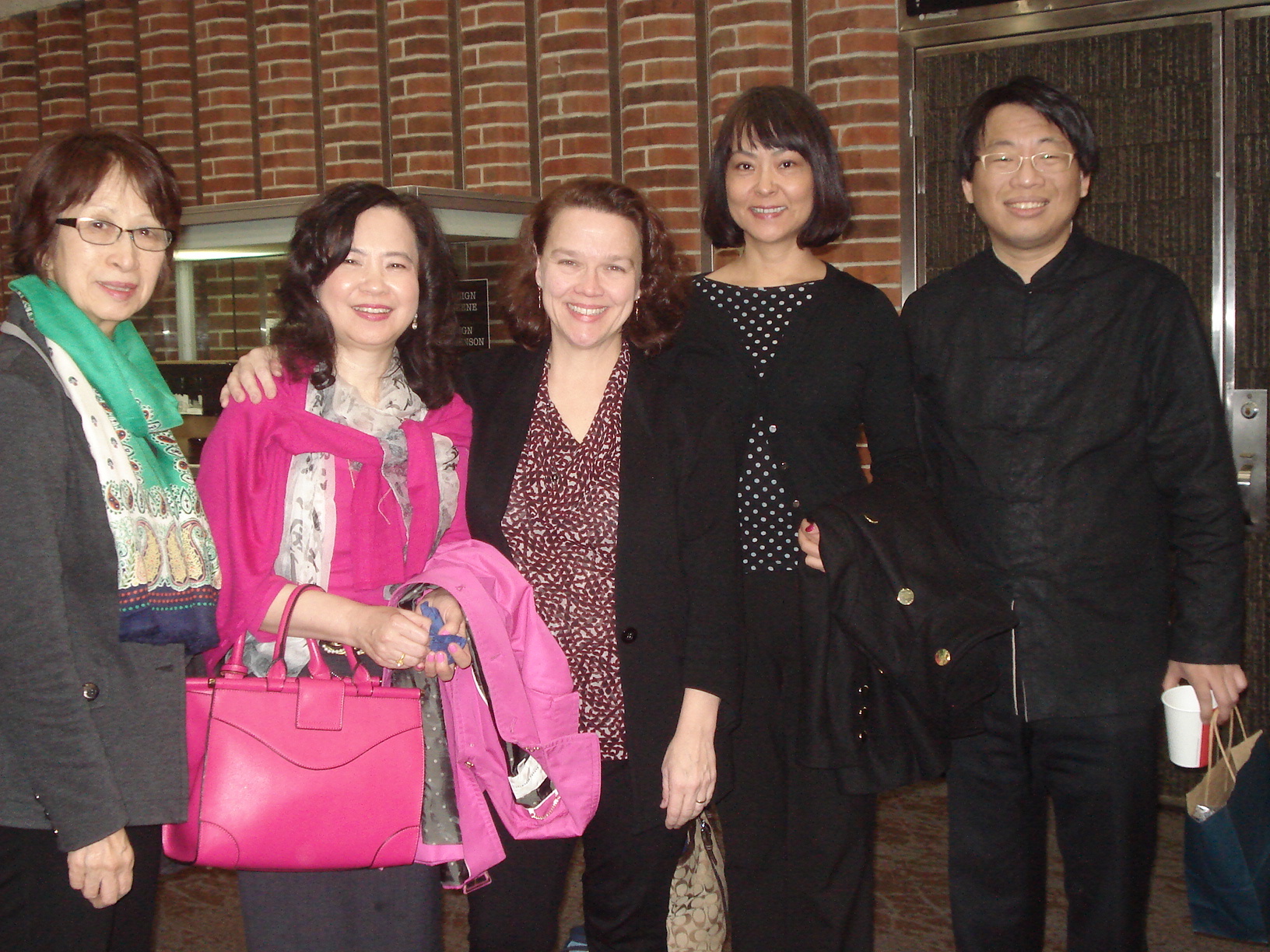 Knoxville colleagues of guest artist Dr. Chih-Long Hu, right, who came to the concert to hear him perform. From left are Kikua Yamada, Meling Lo Martin, Rachel Acuff and Joanne Li.