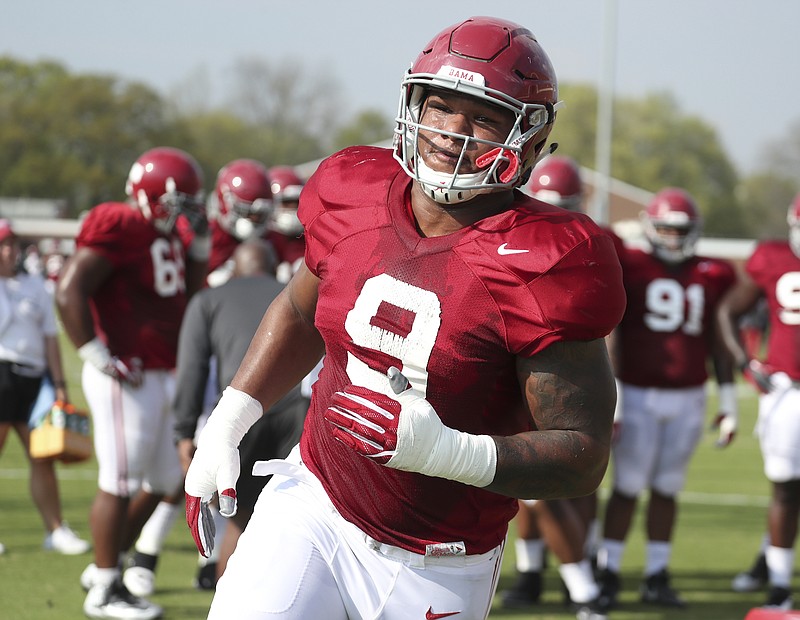 Alabama senior defensive lineman Da'Shawn Hand goes through a drill during a recent spring practice in Tuscaloosa.