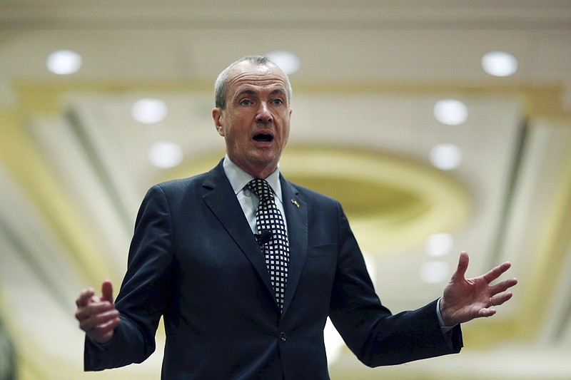 
              FILE – In this Jan. 19, 2017, file photo, Phil Murphy, a Democratic candidate for New Jersey governor and former U.S. ambassador to Germany in President Barack Obama's administration, addresses a gathering in Woodbridge, N.J. Jim Johnson, a rival Democratic candidate for New Jersey governor and former treasury official in President Bill Clinton's administration, filed a complaint Thursday, March 30, 2017, asking the Election Law Enforcement Commission to investigate Murphy, who is also a former Goldman Sachs executive. Johnson's campaign alleges two groups Murphy set up before officially entering the governor's race, New Start New Jersey and New Way for New Jersey, constituted exploratory committees. (AP Photo/Mel Evans, File)
            