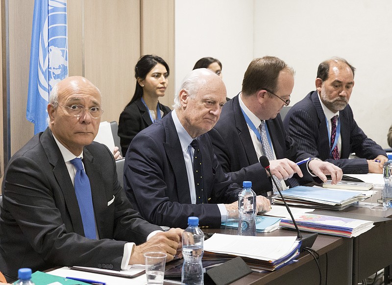 
              UN Special Envoy for Syria Staffan de Mistura, second from left, attends a meeting of Intra-Syria peace talks with Syria's opposition delegation at Palais des Nations in Geneva, Switzerland, Thursday, March 30, 2017. (Xu Jinquan/Pool Photo via AP)
            